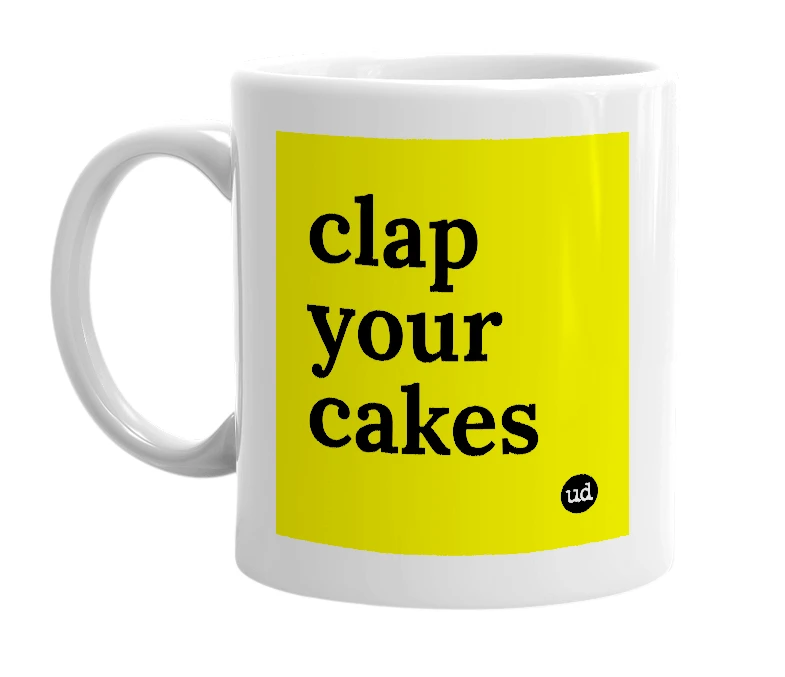 White mug with 'clap your cakes' in bold black letters