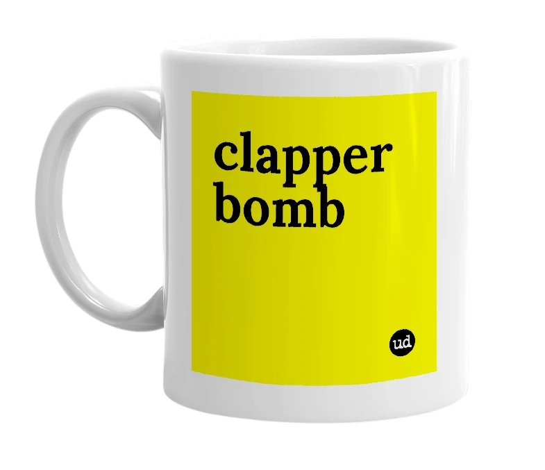 White mug with 'clapper bomb' in bold black letters