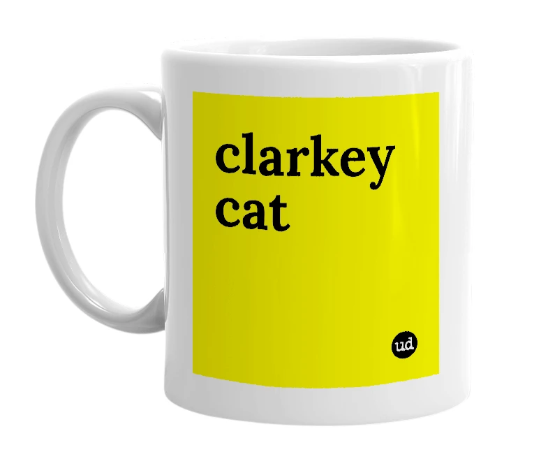 White mug with 'clarkey cat' in bold black letters