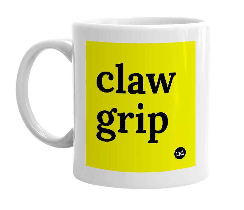 White mug with 'claw grip' in bold black letters