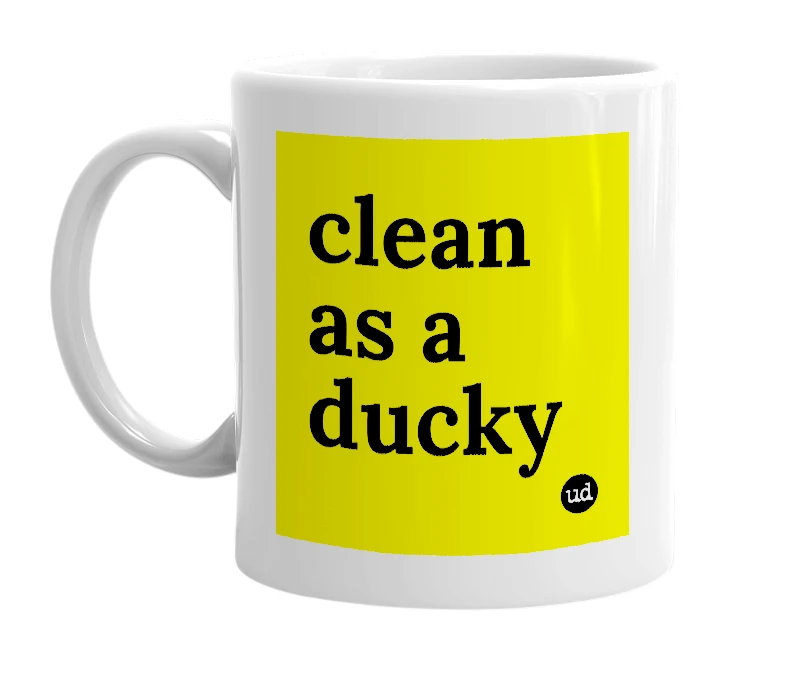 White mug with 'clean as a ducky' in bold black letters