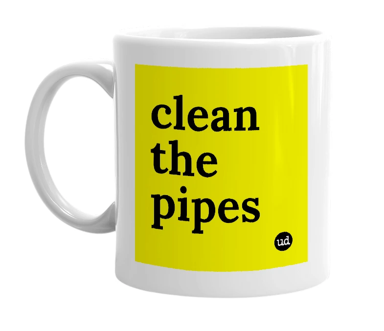 White mug with 'clean the pipes' in bold black letters