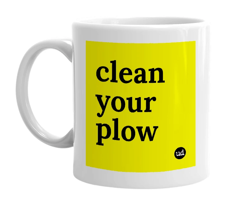 White mug with 'clean your plow' in bold black letters