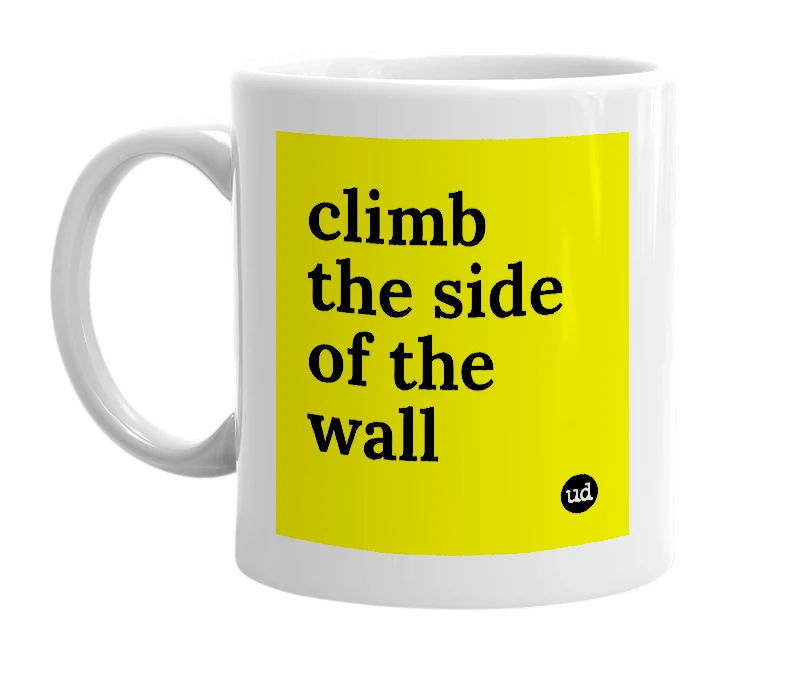 White mug with 'climb the side of the wall' in bold black letters