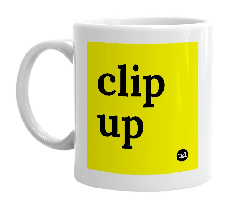 White mug with 'clip up' in bold black letters