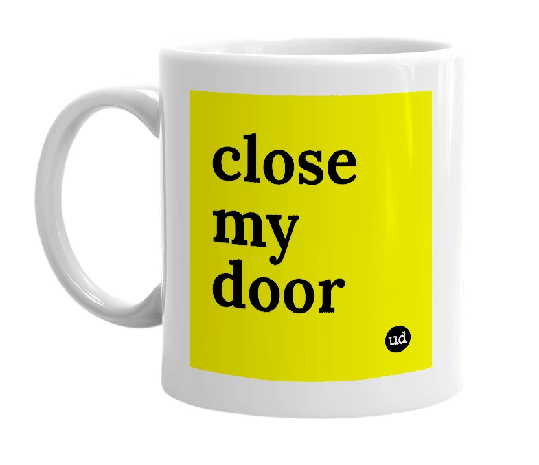 White mug with 'close my door' in bold black letters