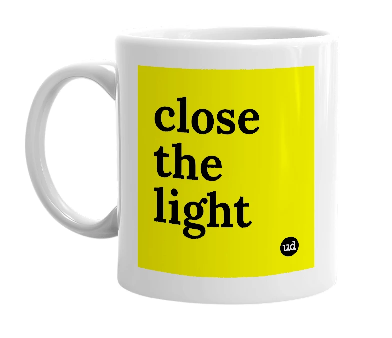 White mug with 'close the light' in bold black letters