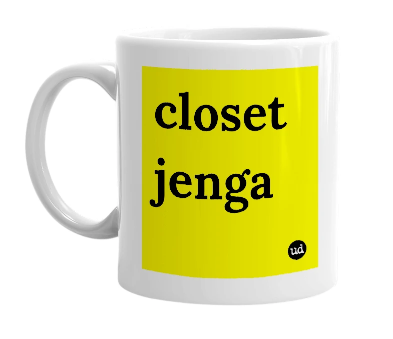 White mug with 'closet jenga' in bold black letters