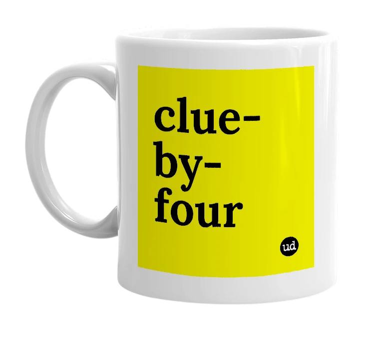 White mug with 'clue-by-four' in bold black letters
