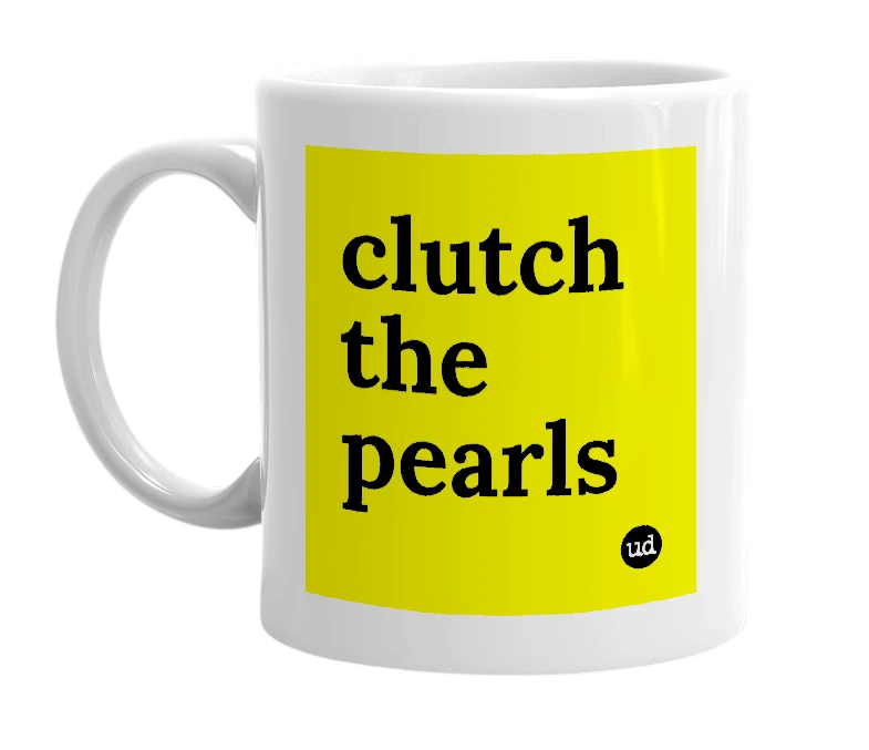 White mug with 'clutch the pearls' in bold black letters