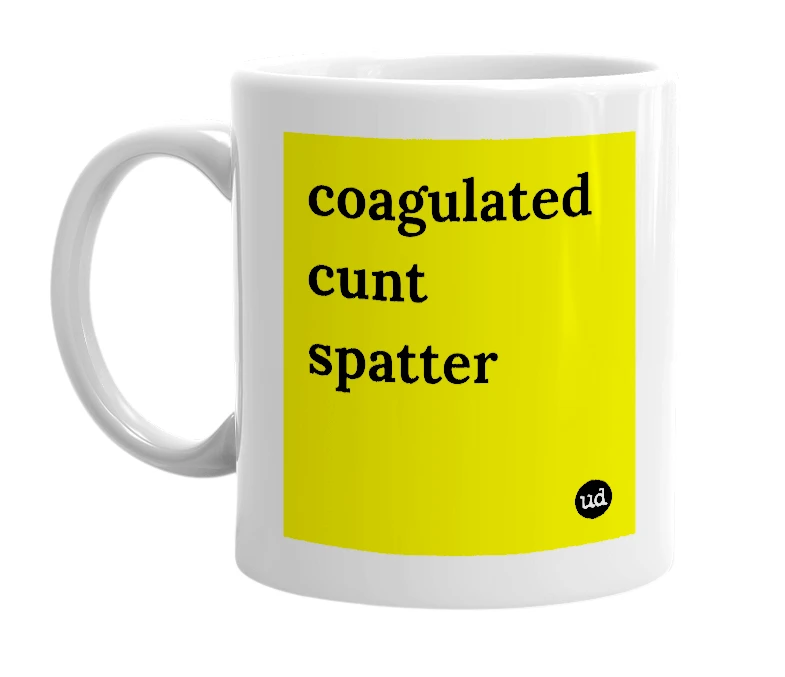 White mug with 'coagulated cunt spatter' in bold black letters