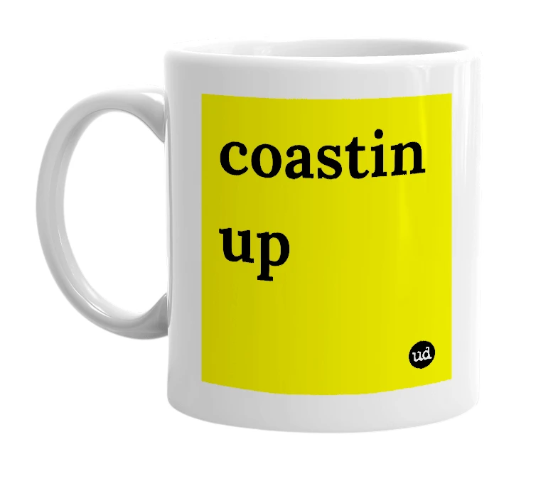 White mug with 'coastin up' in bold black letters