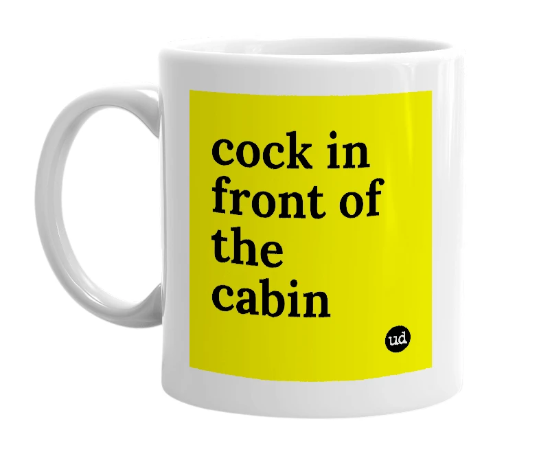 White mug with 'cock in front of the cabin' in bold black letters