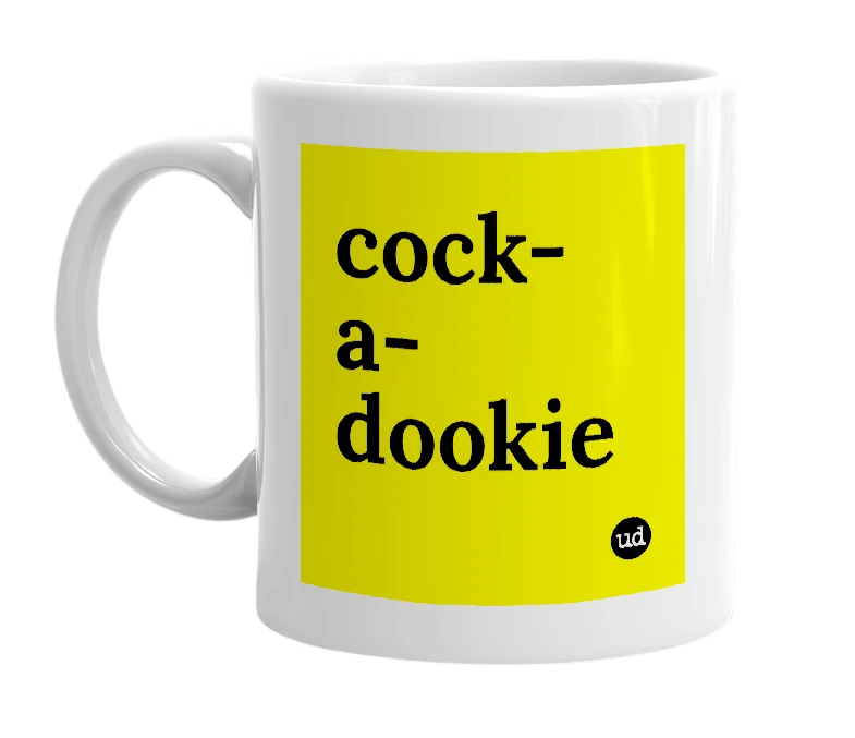 White mug with 'cock-a-dookie' in bold black letters