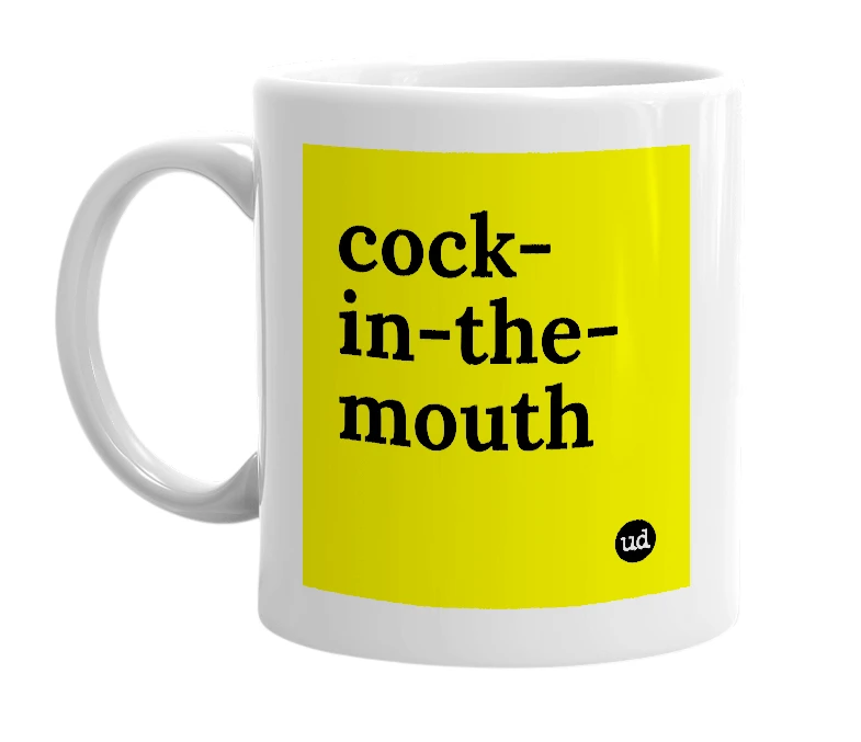 White mug with 'cock-in-the-mouth' in bold black letters