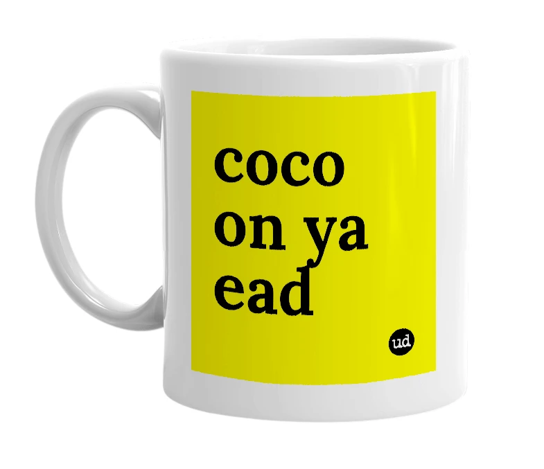 White mug with 'coco on ya ead' in bold black letters