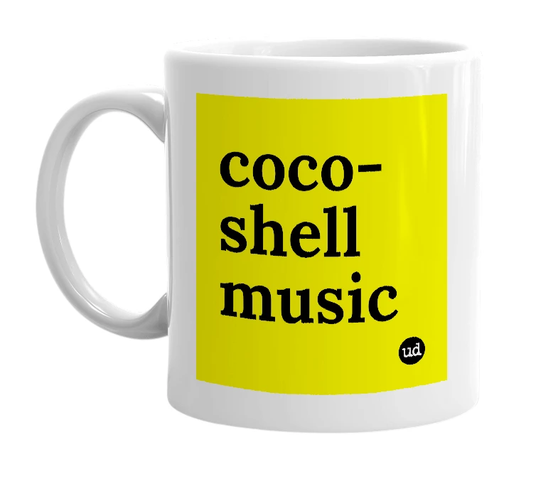 White mug with 'coco-shell music' in bold black letters