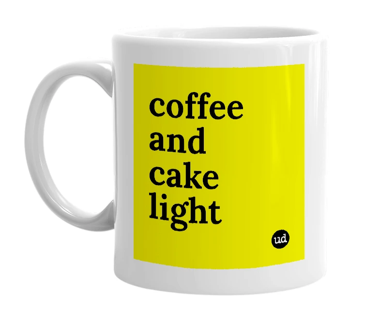 White mug with 'coffee and cake light' in bold black letters
