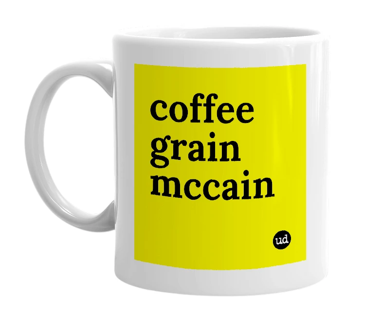 White mug with 'coffee grain mccain' in bold black letters