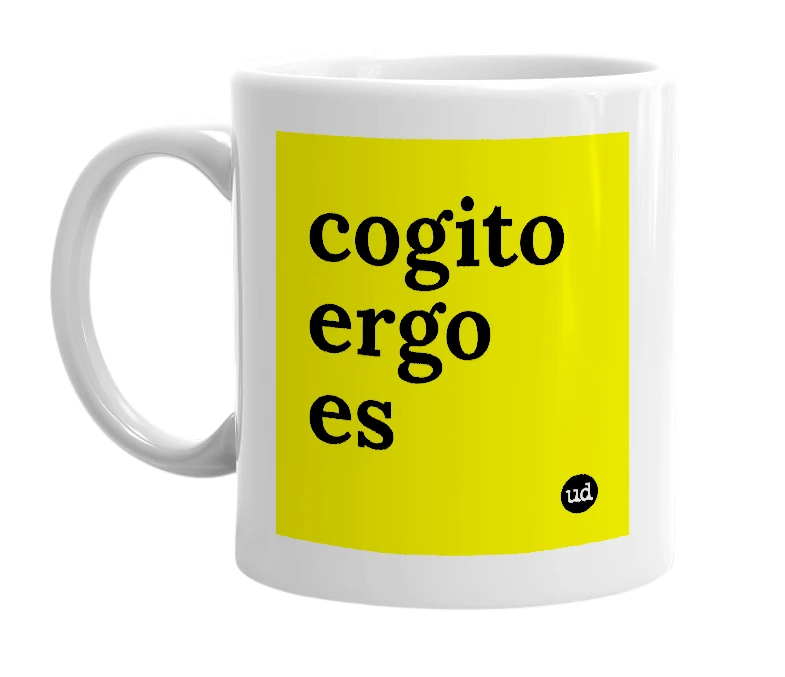 White mug with 'cogito ergo es' in bold black letters