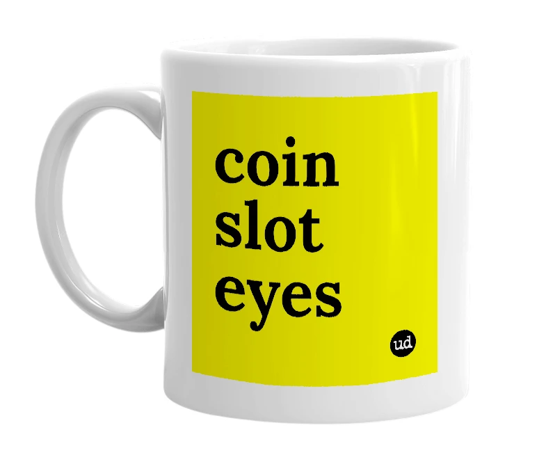 White mug with 'coin slot eyes' in bold black letters