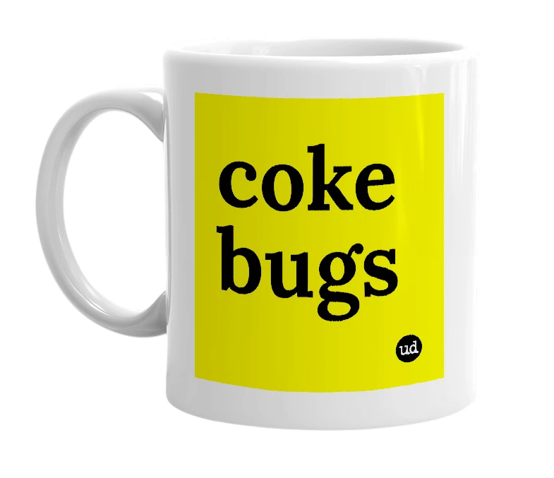 White mug with 'coke bugs' in bold black letters