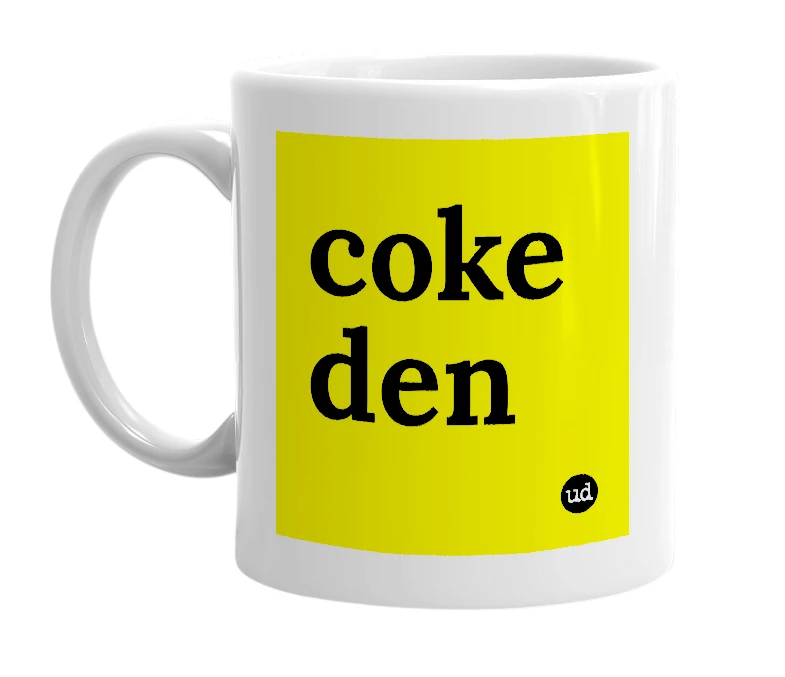 White mug with 'coke den' in bold black letters