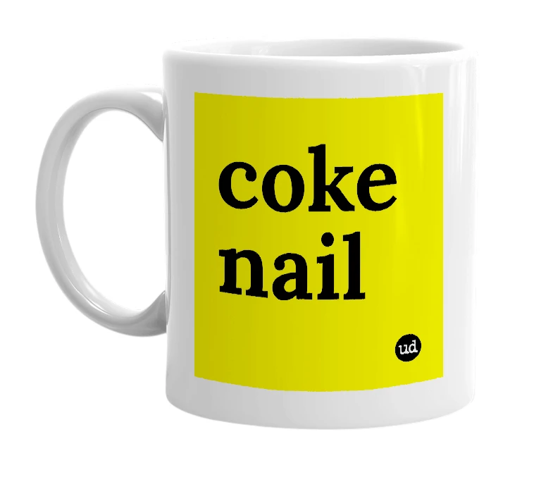 White mug with 'coke nail' in bold black letters