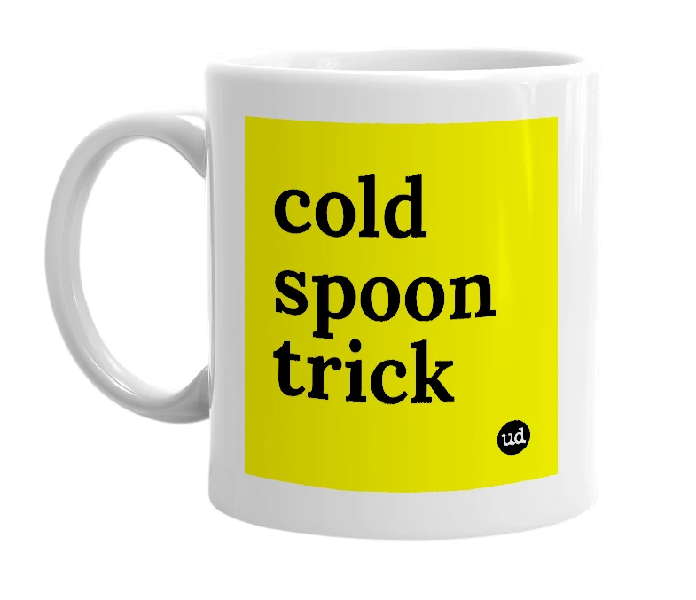 White mug with 'cold spoon trick' in bold black letters