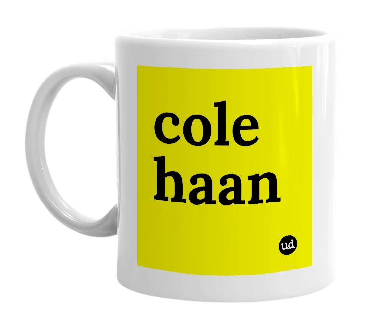 White mug with 'cole haan' in bold black letters