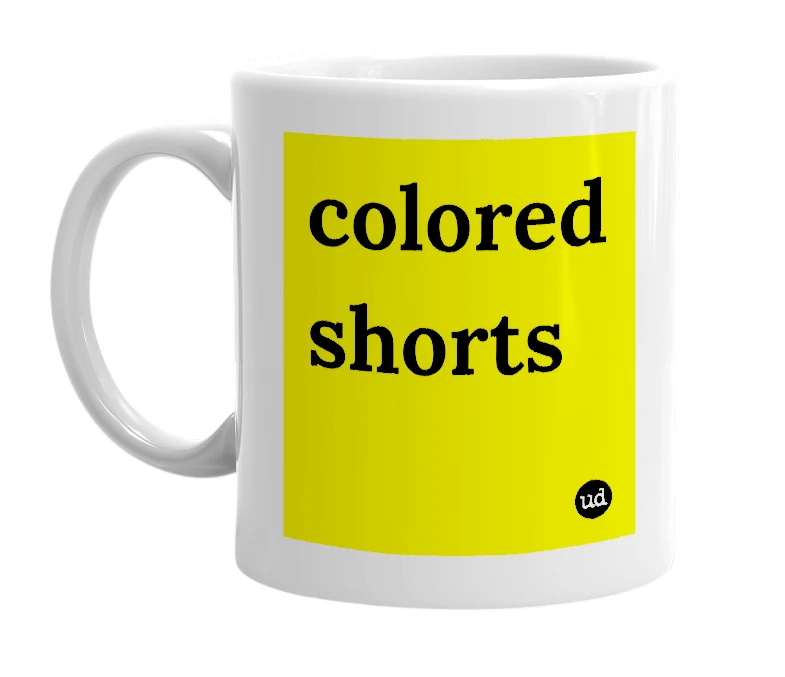 White mug with 'colored shorts' in bold black letters