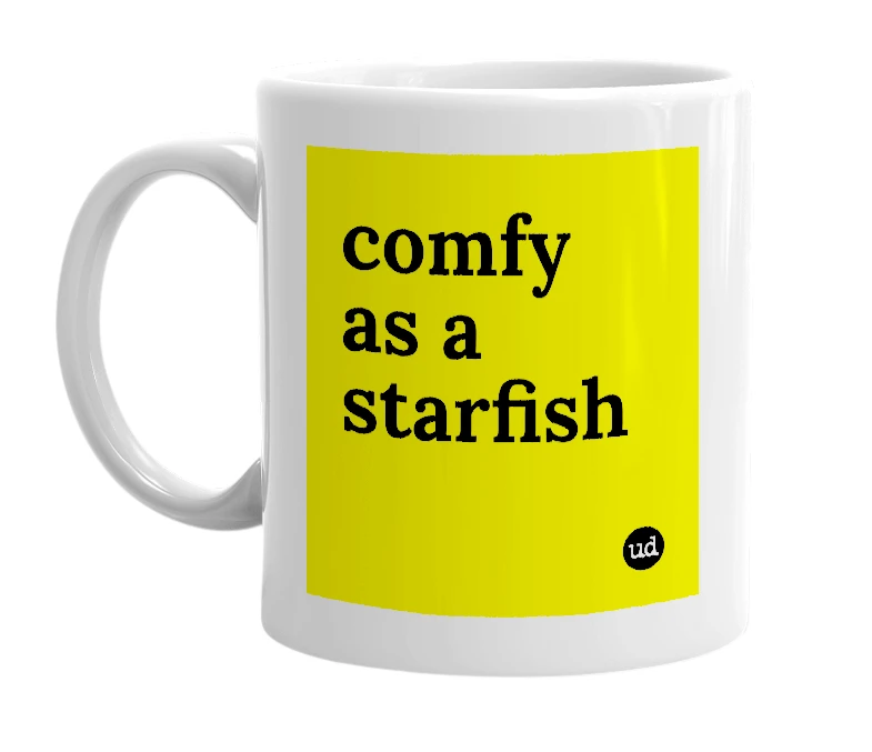 White mug with 'comfy as a starfish' in bold black letters