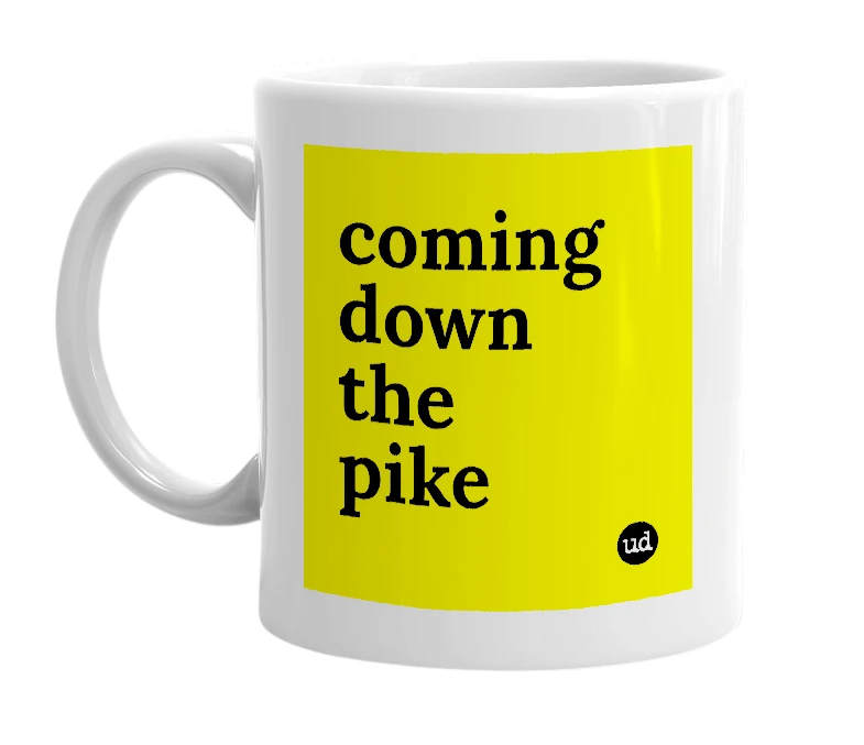 White mug with 'coming down the pike' in bold black letters