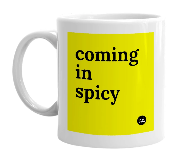 White mug with 'coming in spicy' in bold black letters