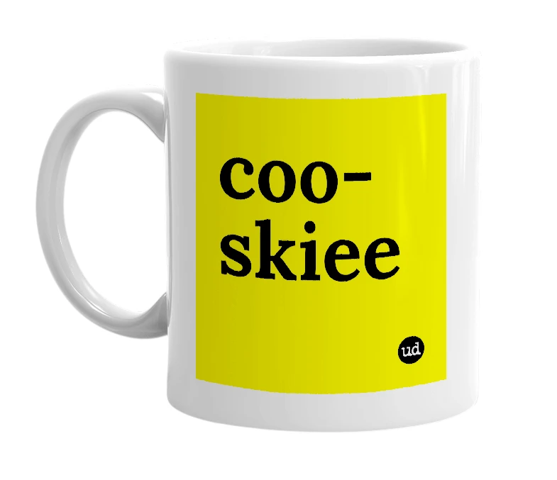 White mug with 'coo-skiee' in bold black letters