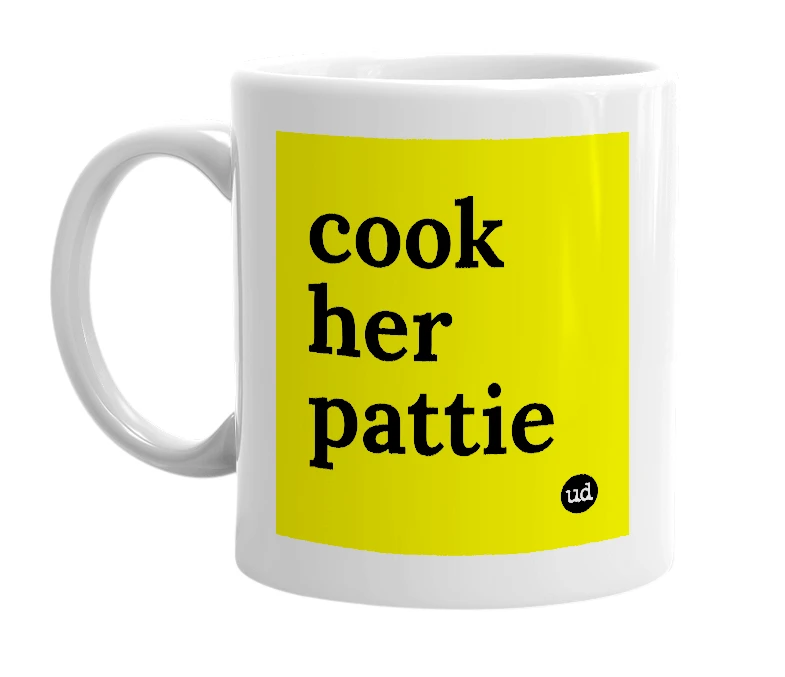 White mug with 'cook her pattie' in bold black letters