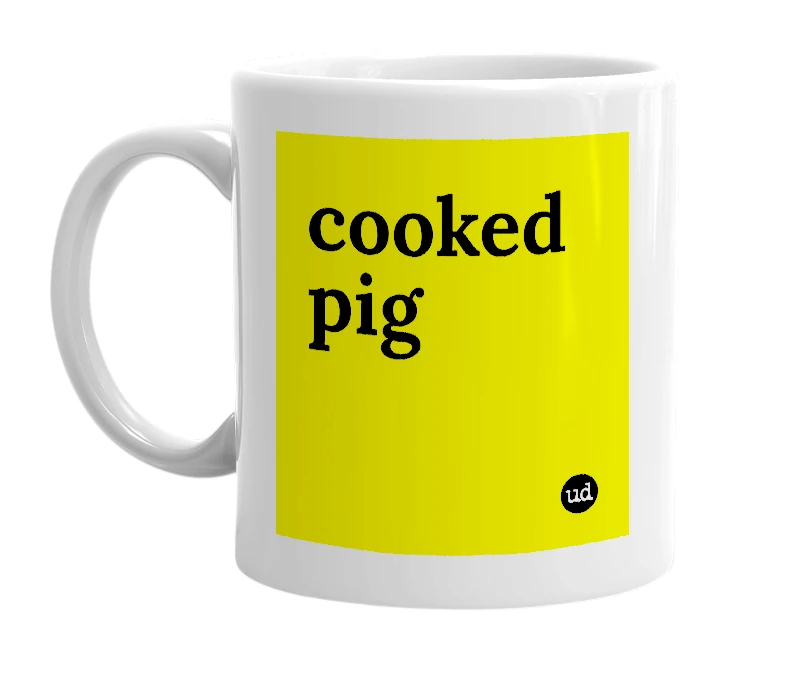 White mug with 'cooked pig' in bold black letters