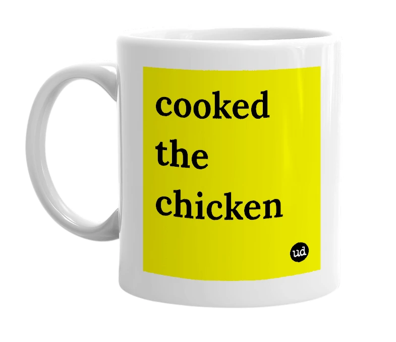White mug with 'cooked the chicken' in bold black letters
