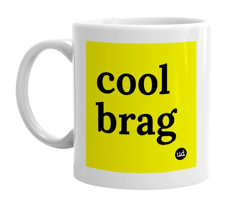 White mug with 'cool brag' in bold black letters