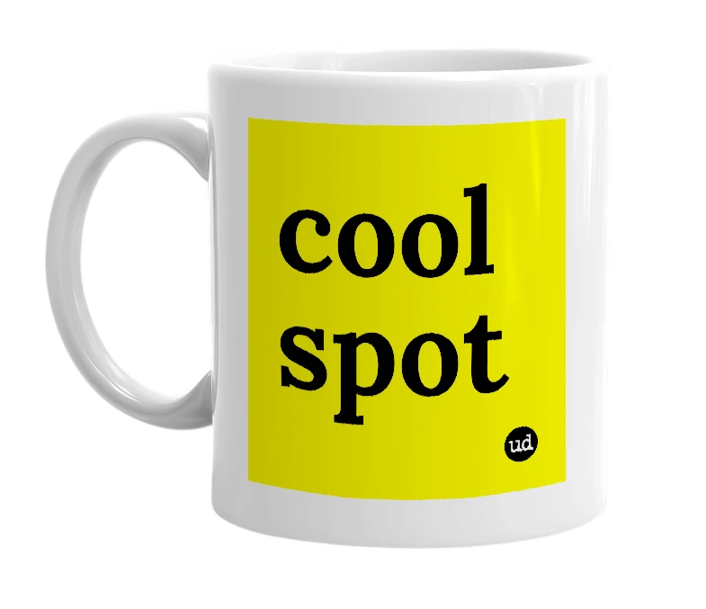 White mug with 'cool spot' in bold black letters
