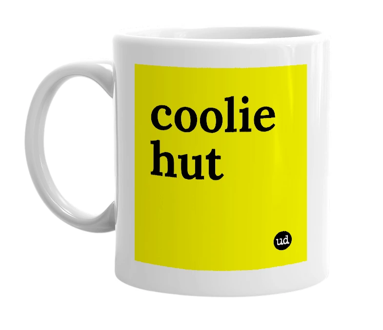 White mug with 'coolie hut' in bold black letters