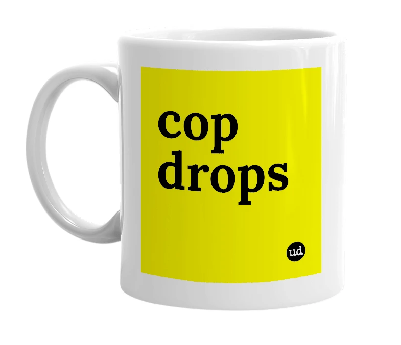 White mug with 'cop drops' in bold black letters