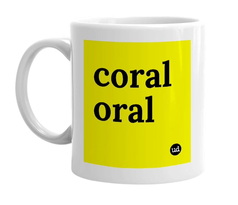 White mug with 'coral oral' in bold black letters