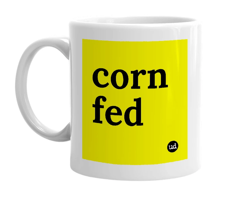 White mug with 'corn fed' in bold black letters
