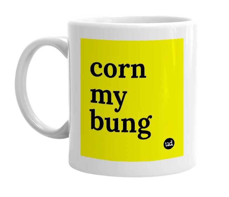 White mug with 'corn my bung' in bold black letters