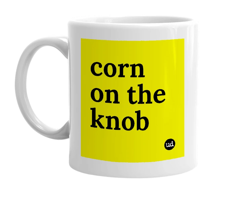 White mug with 'corn on the knob' in bold black letters
