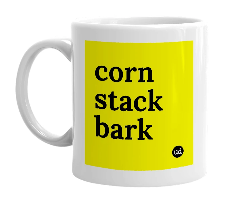 White mug with 'corn stack bark' in bold black letters