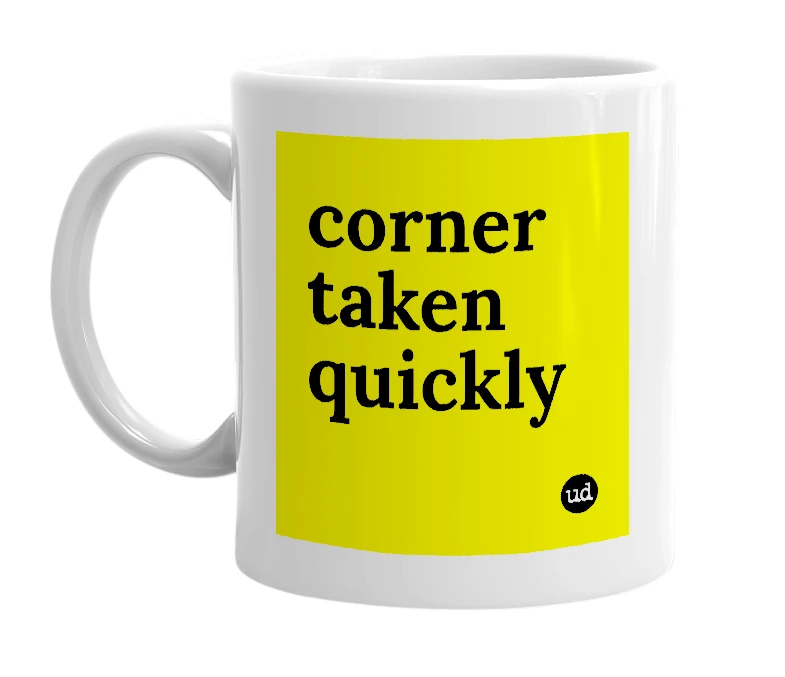 White mug with 'corner taken quickly' in bold black letters