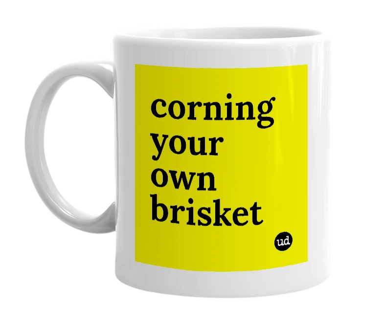 White mug with 'corning your own brisket' in bold black letters