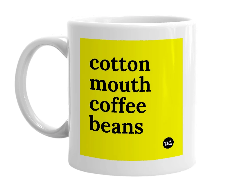 White mug with 'cotton mouth coffee beans' in bold black letters